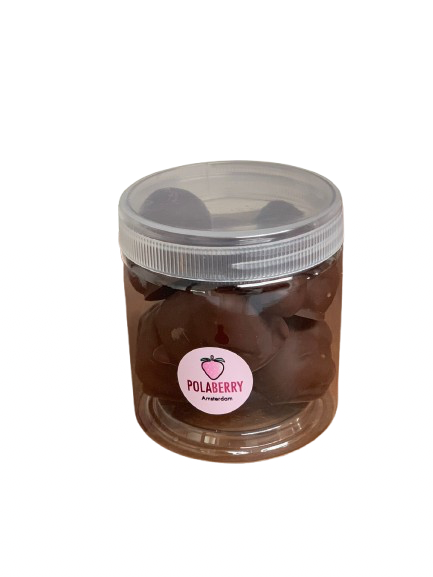 Strawberries dipped in chocolate jar